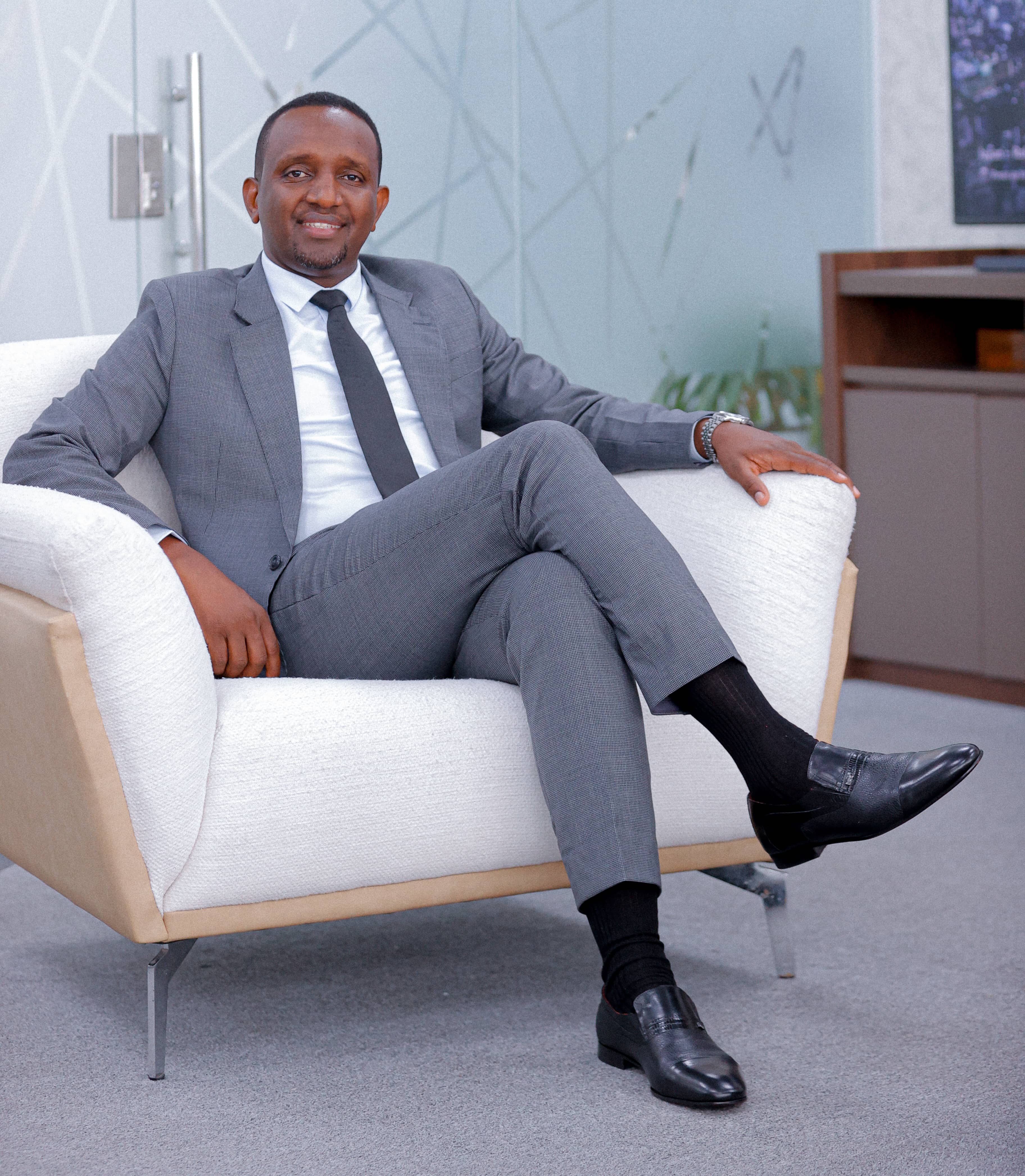 Hersi Said sitting in a chair